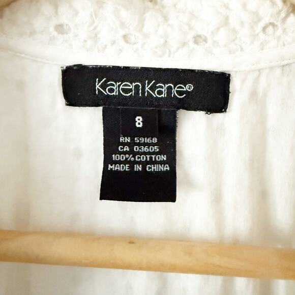 KAREN KANE | White Eyelet Embroidered Wrap Dress Collar Cap Sleeve Tie | Size 8 - Picture 5 of 10